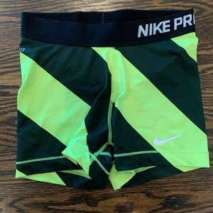 Black and yellow Nike pro spandex shorts